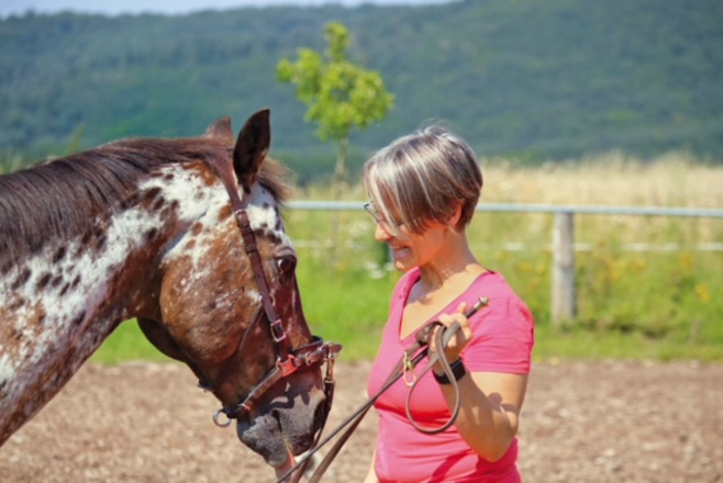 Tina mit einem Pferd